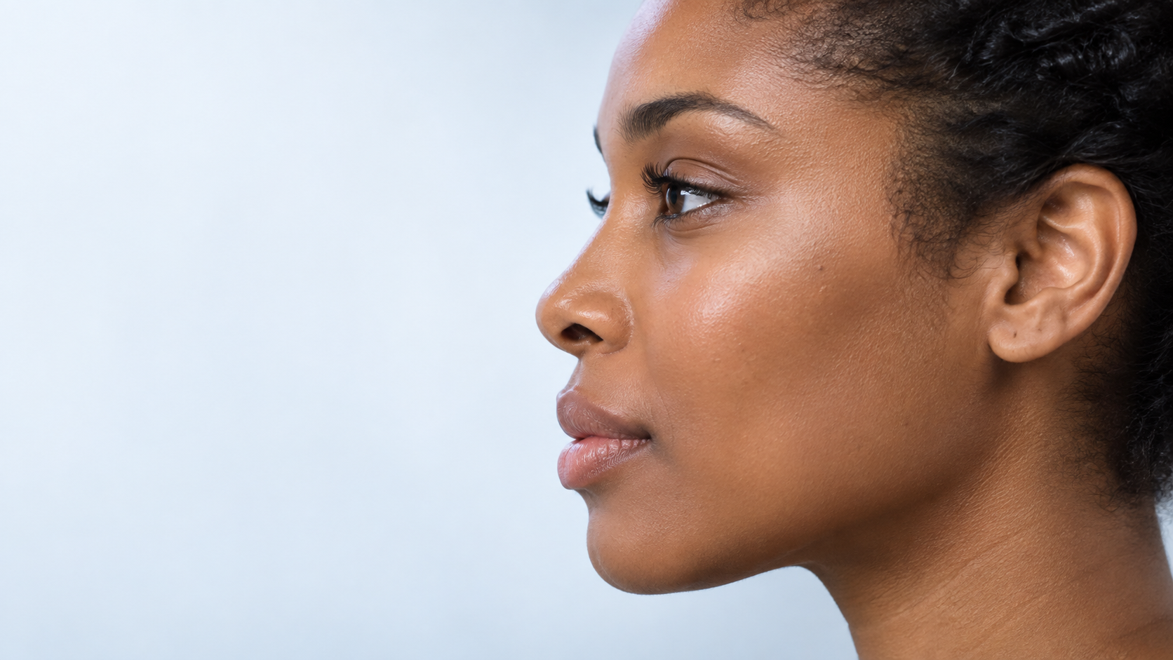 Illustrative side-profile portrait with natural skin texture